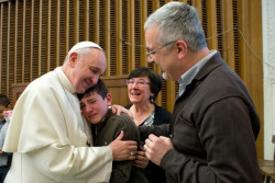 March 29, 2014: Pope Francis greets a blind boy during a audience at the vatican. EDITORIAL USE ONLY. NOT FOR SALE FOR MARKETING OR ADVERTISING
